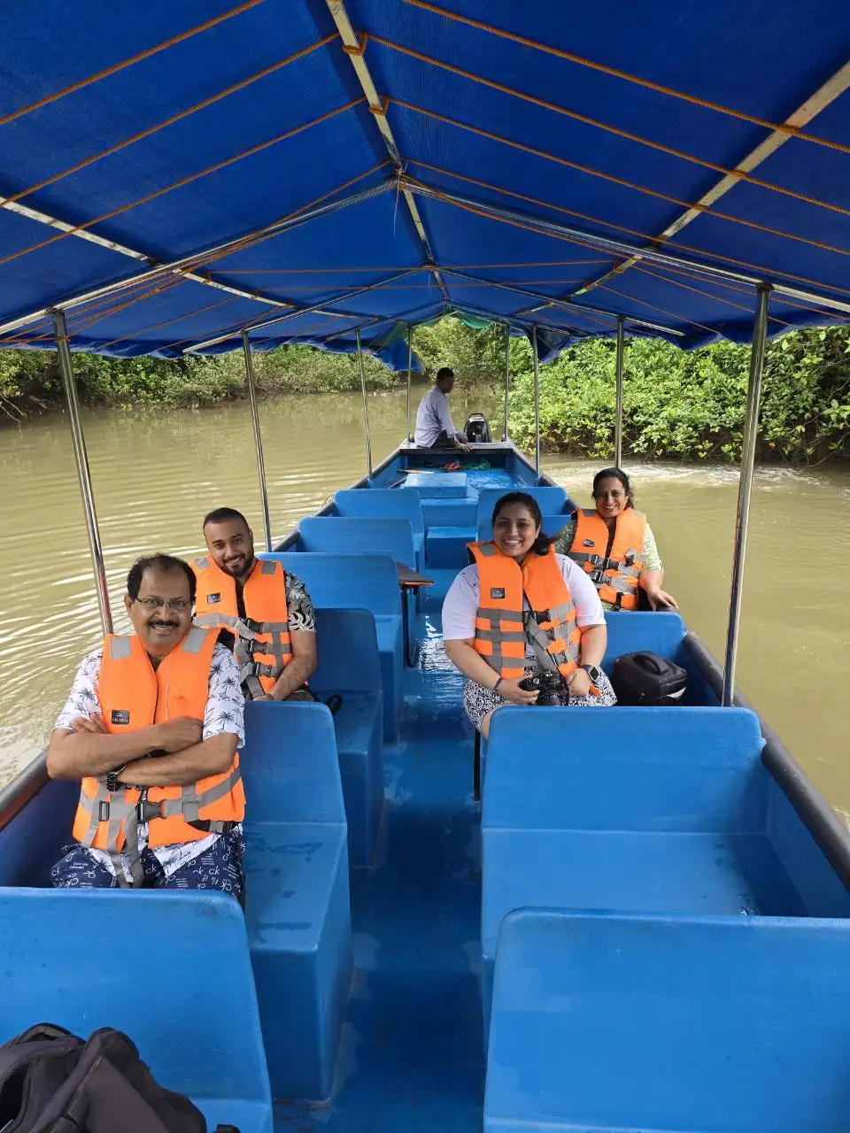Local guide showing a visitor around Goa